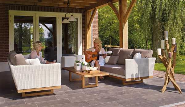 Two people relaxing on a custom concrete patio